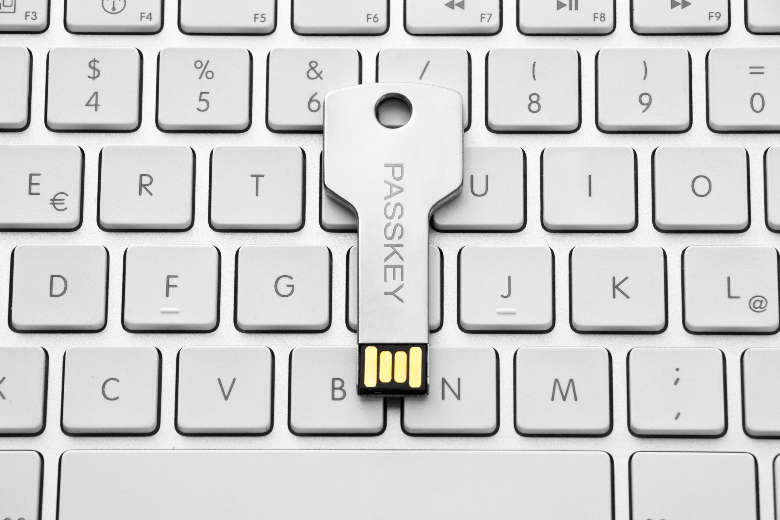 What are passkeys and how do they work with password managers?